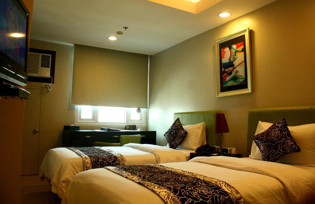 The Exchange Regency Residence Hotel Managed By Hii Pasig City Exterior foto